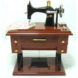 Sewing machine music box using hand cranked